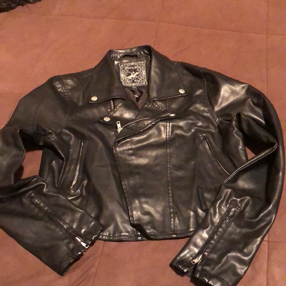 Short black “leather” jacket , never worn